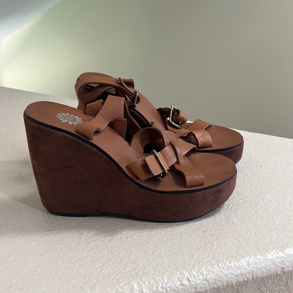 Brown wedge sandals . Top leather and bottom suede.‎ Size 7